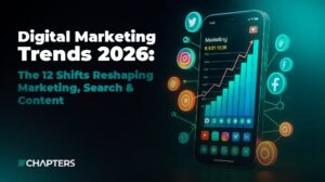 Digital marketing trends in 2026 written text next to a mobile phone with a trending up graph and social media icons popping out of it.
